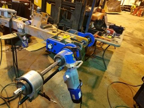Climax line boring bar set up for a heavy-equipment repair